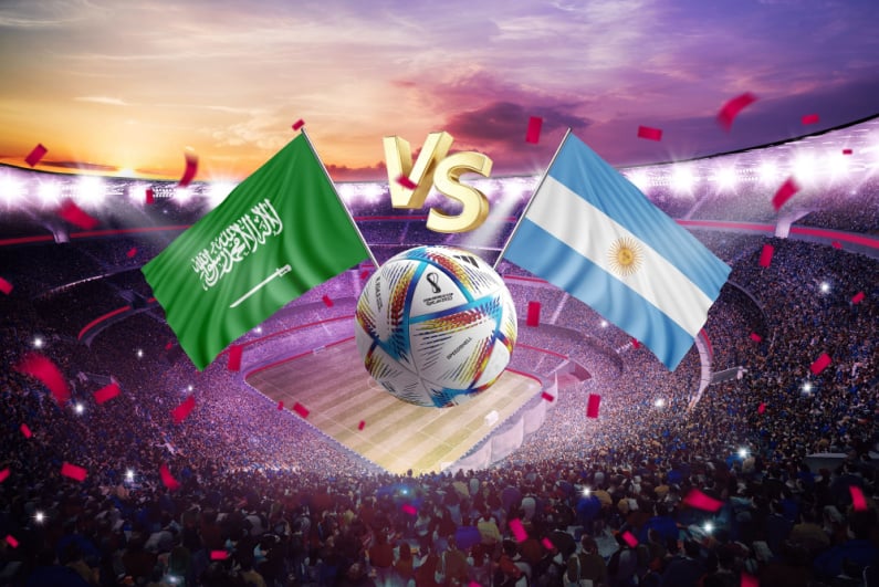 Saudi Arabia and Argentina flags with a World Cup soccer ball