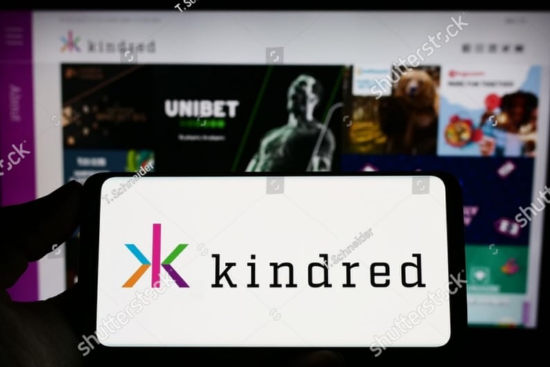 Kindred Group logo on a phone