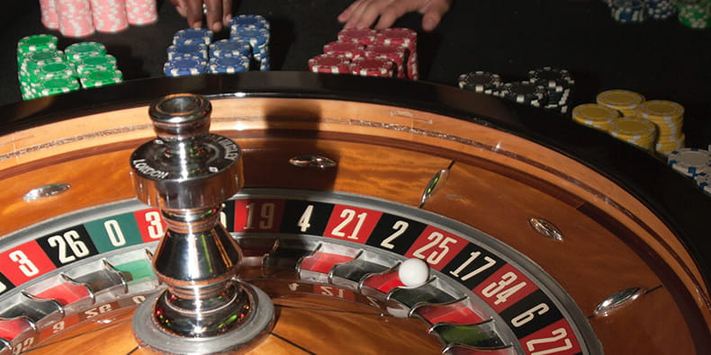 A Roulette Wheel and Casino Chips