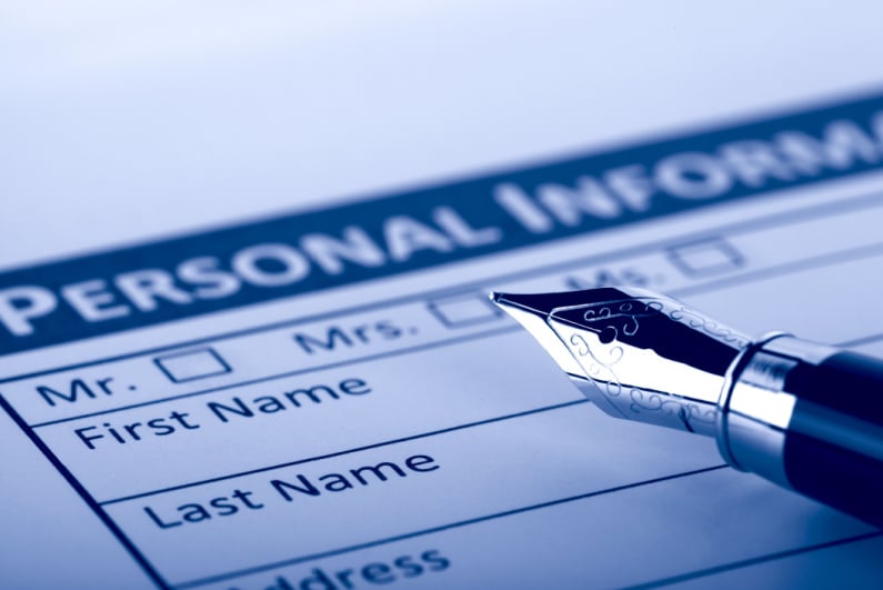 Filling out personal information on a document